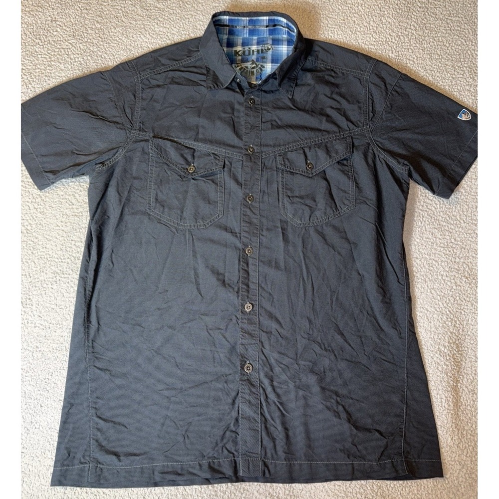 Kuhl Men's Short Sleeve Button-Down Shirt in Dark Gray with Blue Plaid Lining